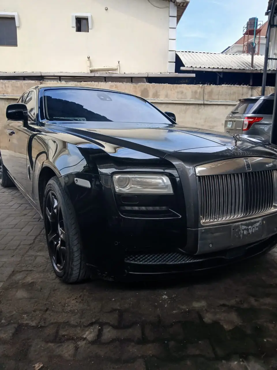 Rolls Royce Ghost black front three-quarter